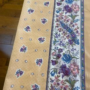 Pretty French tablecloth in pastel peach, blue, and white floral pattern